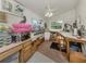 Well-organized craft room equipped with ample storage and a comfortable work space at 337 Harbor S Dr, Venice, FL 34285