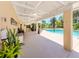 Spacious covered patio perfect for outdoor dining and relaxation with a view of the pool at 337 Harbor S Dr, Venice, FL 34285