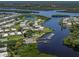 Breathtaking aerial view of a waterfront community with private docks and serene water access at 379 Harbor Isles Dr, North Port, FL 34287