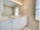 Bathroom featuring dual sinks with ample counter space at 4062 Green Tree Ave, Sarasota, FL 34233