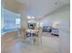 Open-concept dining room features an abundance of natural light at 4062 Green Tree Ave, Sarasota, FL 34233