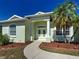 Close-up of the front entrance, highlighting the architectural details and covered entry at 4062 Green Tree Ave, Sarasota, FL 34233