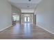 Living room showcasing an open floor plan with views of the dining area and front entrance at 4062 Green Tree Ave, Sarasota, FL 34233