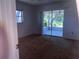 Spacious bedroom provides access to a screened lanai, extending the living space outdoors at 407 Bahama Rd, Venice, FL 34293