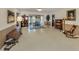Spacious living area with neutral walls and floors, offering a versatile space for personalization and decor at 444 Driftwood Rd, Venice, FL 34293