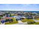 Waterfront homes featuring boat docks and canals in a sunny residential neighborhood near open water at 5265 Neville Ter, Port Charlotte, FL 33981