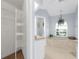 Bathroom with soaking tub, walk-in closet, neutral colors and decorative plants at 5265 Neville Ter, Port Charlotte, FL 33981