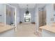 Ensuite bathroom showcasing a soaking tub, shower, dual sinks, and ample natural light at 5265 Neville Ter, Port Charlotte, FL 33981