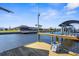 Beautiful backyard boat dock provides direct access to the channel at 5265 Neville Ter, Port Charlotte, FL 33981