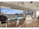 The screened patio overlooks the pool, canal and boat dock providing outdoor enjoyment at 5265 Neville Ter, Port Charlotte, FL 33981