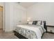 Comfortable bedroom with a bed, closet, and neutral decor and lots of natural light at 5585 Semolino St, Nokomis, FL 34275