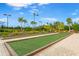 Bocce ball court with well maintained court and landscaping at 5585 Semolino St, Nokomis, FL 34275