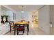 Dining area featuring a wooden table with seating for four and built in china cabinet at 5619 Bayshore Rd # 421, Palmetto, FL 34221