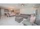 Open-concept living space with recessed lighting, ceiling fan, and views of the kitchen at 5632 Long Shore Loop, Sarasota, FL 34238