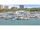 Lively marina with numerous boats docked amidst stunning waterfront views at 5632 Long Shore Loop, Sarasota, FL 34238