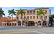 Exterior of the Sarasota Opera House with palm trees and detailed architecture at 5632 Long Shore Loop, Sarasota, FL 34238