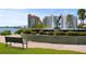 Relaxing park scene featuring a fountain, seating, and lush landscaping at 5632 Long Shore Loop, Sarasota, FL 34238