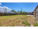 Expansive backyard with a privacy fence and a concrete pad at 5755 Oxalis Rd, Venice, FL 34293
