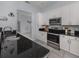 Contemporary kitchen with stainless steel appliances and sleek countertops at 5931 Plover Rd, Venice, FL 34293
