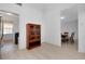 Open dining area showcasing a wooden china cabinet, dining table and chairs next to the kitchen at 610 Alligator Dr, Venice, FL 34293