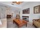 Open-concept living area with dining room, kitchen and a spiral staircase enhance the appeal of this living space at 610 Alligator Dr, Venice, FL 34293