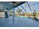 Spacious screened-in pool area with ample deck space, perfect for outdoor entertaining and relaxation at 610 Alligator Dr, Venice, FL 34293