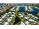 Beautiful aerial shot featuring waterfront living and well-maintained community at 611 Paget Dr, Venice, FL 34293