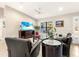 Cozy living room with neutral walls, tile flooring, and stylish decor at 6126 Spinnaker Blvd, Englewood, FL 34224
