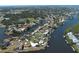 Stunning aerial view of waterfront homes with private docks and access to the bay at 617 Bonito Ave, Nokomis, FL 34275