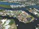 Scenic aerial view of the neighborhood's waterfront homes with backyard boat docks, on interconnected canals at 617 Bonito Ave, Nokomis, FL 34275