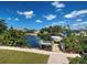 Waterfront backyard with private dock and canal access at 617 Bonito Ave, Nokomis, FL 34275