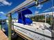 Boat in lift along the canal at 617 Bonito Ave, Nokomis, FL 34275