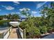 View of boat docked along waterfront home at 617 Bonito Ave, Nokomis, FL 34275