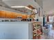 Charming kitchen featuring light wood cabinets and a convenient breakfast bar area at 617 Bonito Ave, Nokomis, FL 34275