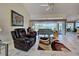 Spacious living room showcasing high ceilings and a view of the water at 617 Bonito Ave, Nokomis, FL 34275