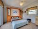 Inviting main bedroom with built-in cabinets, ceiling fan, and comfortable carpet for a relaxing retreat at 617 Bonito Ave, Nokomis, FL 34275