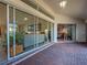Enclosed patio offering views of the interior living spaces and the canal beyond at 617 Bonito Ave, Nokomis, FL 34275