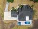 Aerial shot shows the layout of the home, pool, gazebo, driveway, and surrounding greenery at 6824 283Rd E St, Myakka City, FL 34251