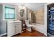 Small bathroom featuring a vanity with storage and a shower-tub combo at 6824 283Rd E St, Myakka City, FL 34251