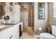Clean bathroom features a vanity, toilet, and glass-enclosed shower at 6824 283Rd E St, Myakka City, FL 34251