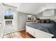 Comfortable bedroom featuring a full bed and an exit to the exterior patio at 6824 283Rd E St, Myakka City, FL 34251