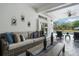 Enjoy a relaxing covered patio with comfortable seating overlooking the pool and scenic outdoor space at 6824 283Rd E St, Myakka City, FL 34251