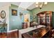 Charming dining room featuring hardwood floors, display cabinet, and view to kitchen at 6824 283Rd E St, Myakka City, FL 34251