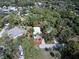 Aerial view of a charming home nestled amongst lush mature trees at 770 Yale St, Englewood, FL 34223