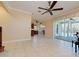 Open floor plan with tile flooring and access to outdoor living area at 770 Yale St, Englewood, FL 34223