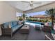 Relaxing screened patio with comfortable seating overlooking the sparkling pool at 791 Cumberland Rd, Venice, FL 34293