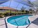 Enclosed swimming pool offering refreshing retreat with blue water and sunny surroundings at 791 Cumberland Rd, Venice, FL 34293