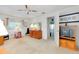 Bedroom featuring light neutral tones and traditional furniture at 810 Anchorage Ln, Palm Harbor, FL 34685