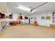 Spacious garage area with lots of room and storage cabinets at 810 Anchorage Ln, Palm Harbor, FL 34685