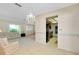 Living room with neutral walls, chandelier, and an open layout at 810 Anchorage Ln, Palm Harbor, FL 34685